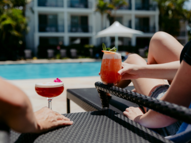 Poolside Cocktails Lounging by the Oasis Pool
